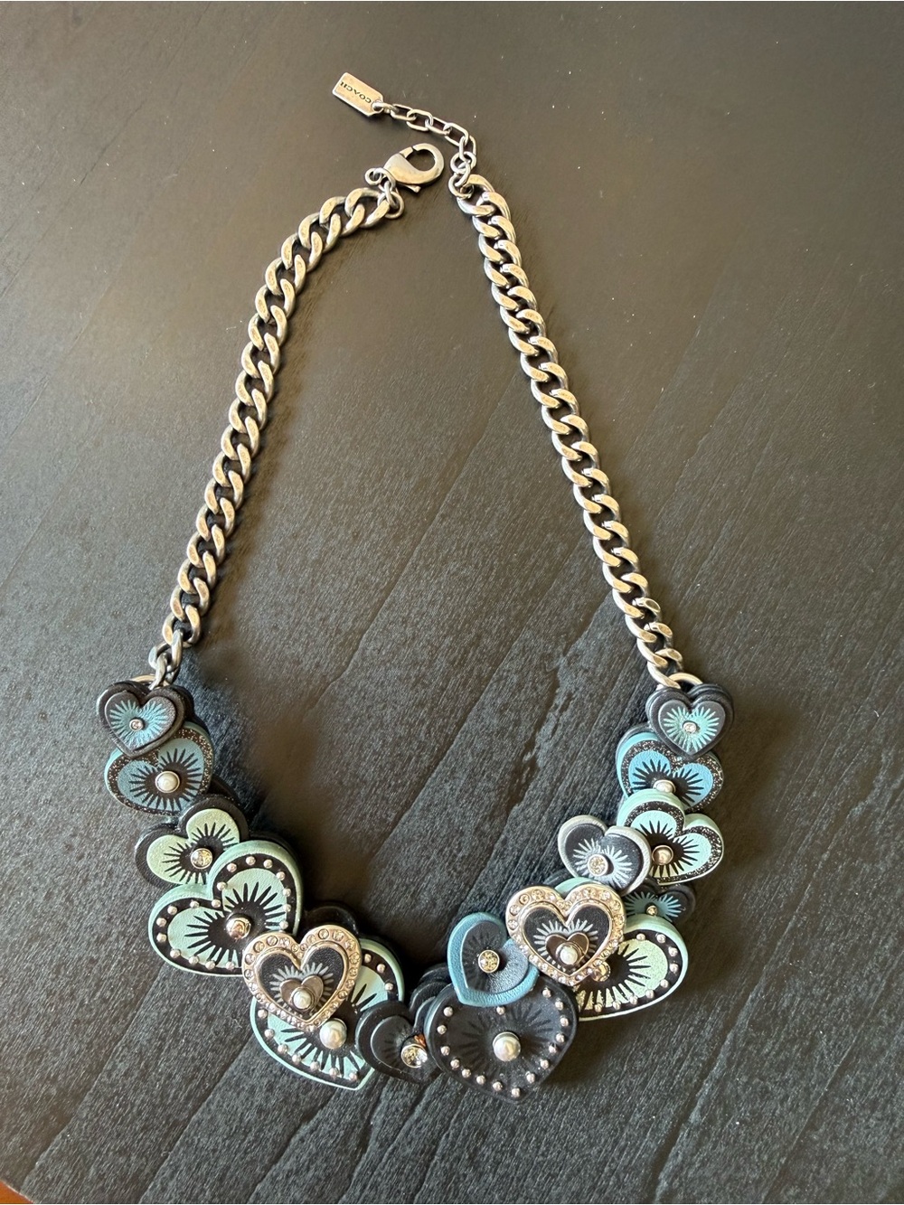Coach Silver-Tone Heart Necklace with Teal and Black Accents